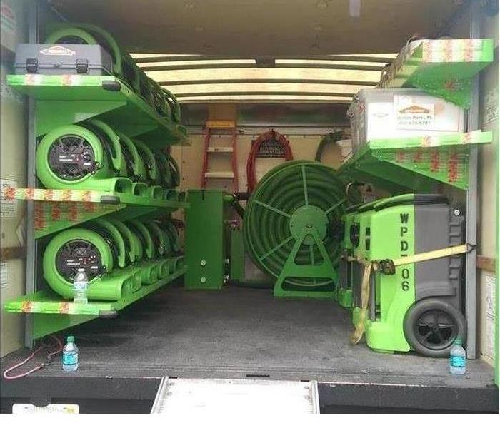 Drying equipment in the back of a SERVPRO truck 