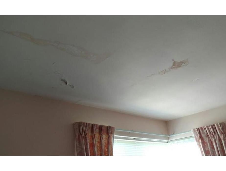 Signs of water damage in the ceiling